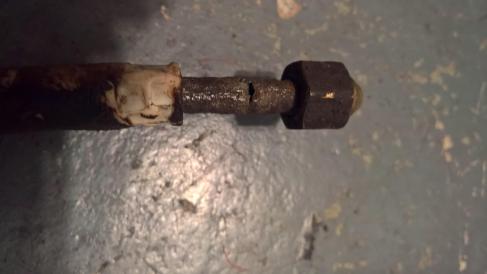 old leaking rusty fuel pipe